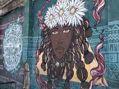 04C Mural of a woman with flowers in her hair inside the abandoned warehouse, the home of Paint Jamaica street art in Kingston Jamaica